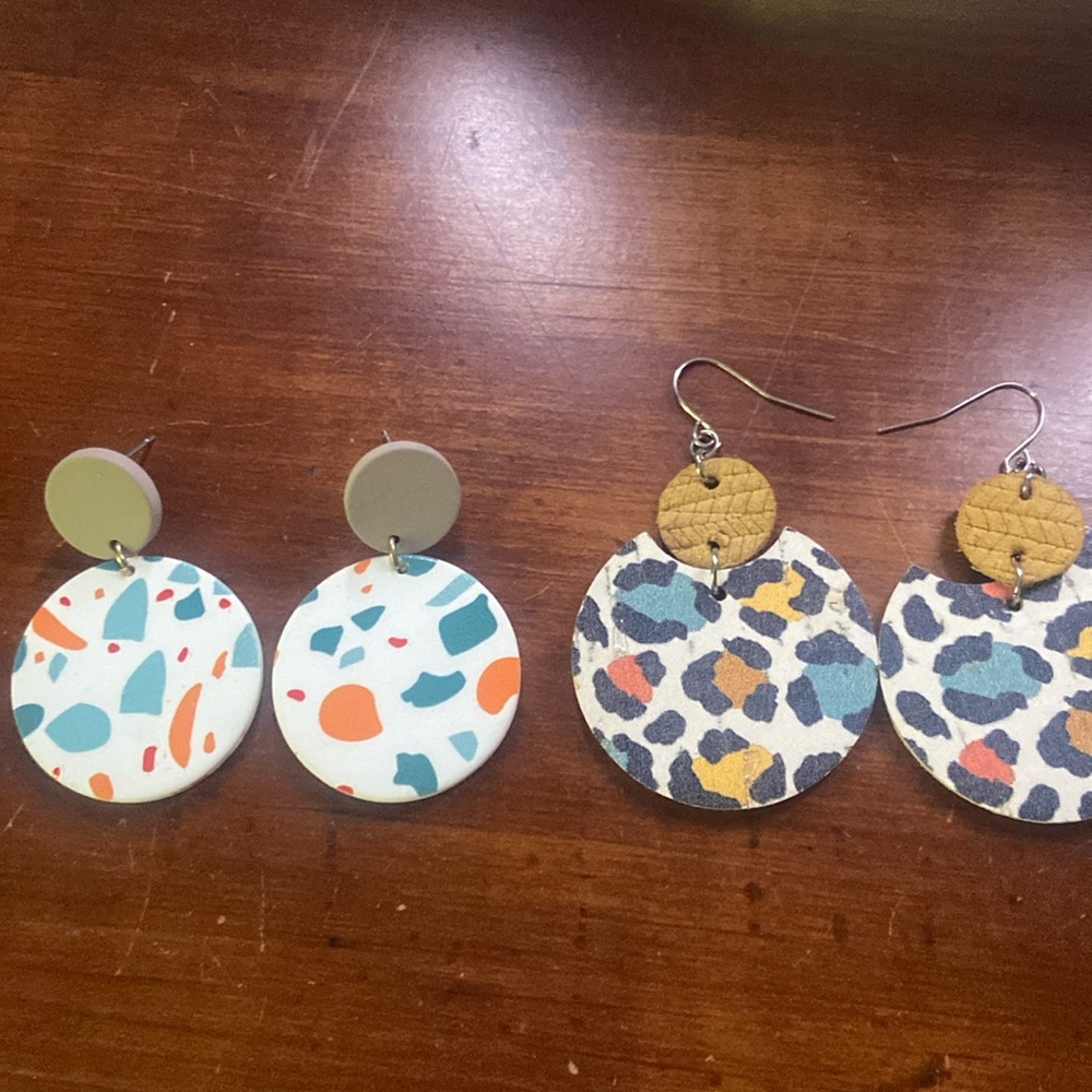 Spotted and leopard print earrings. Both great condition.